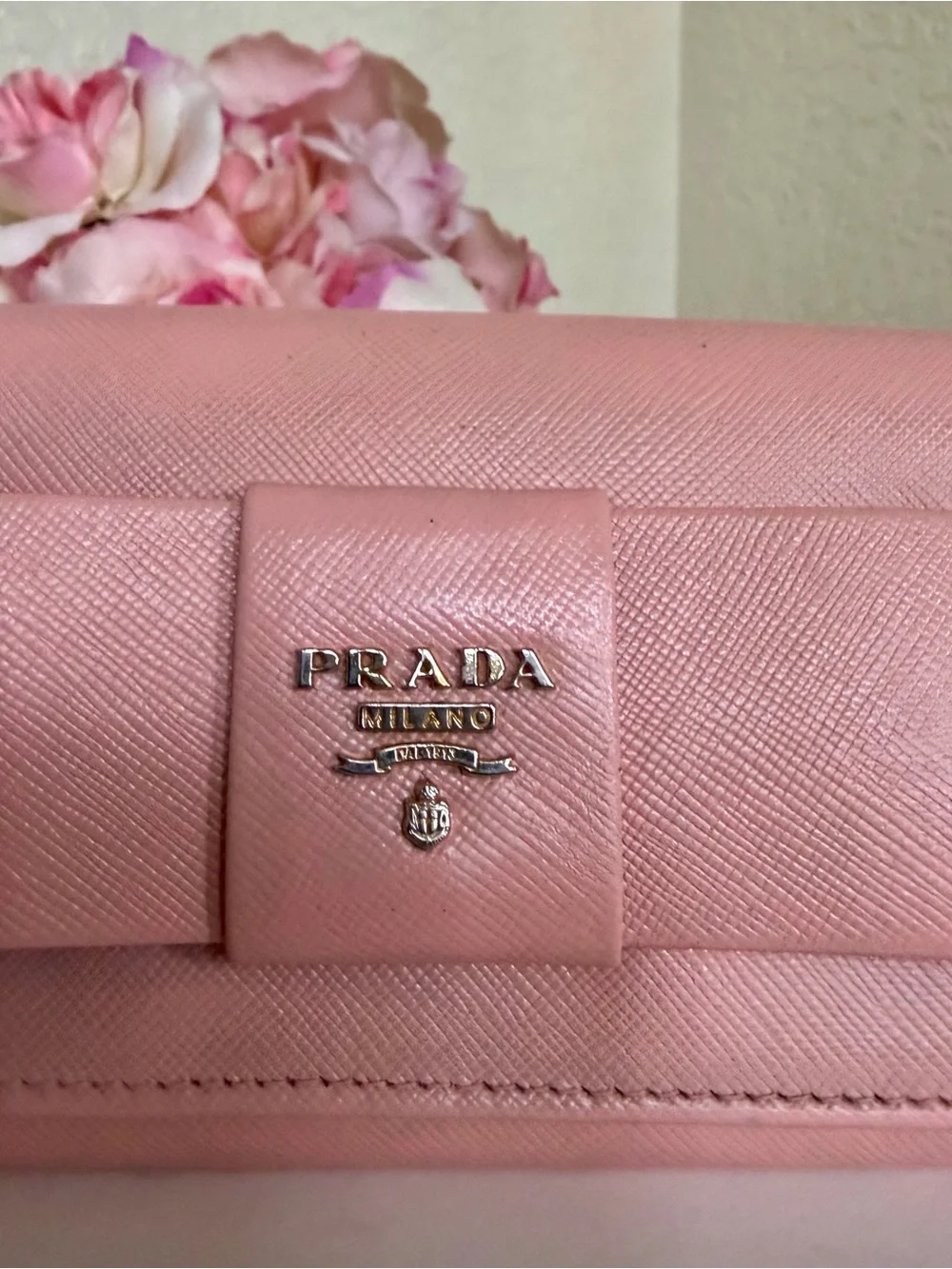Pink Prada Saffiano leather long wallet flap closure with bow
